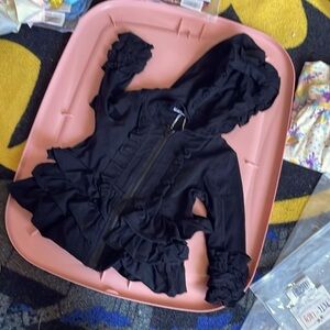 Pete + Lucy black hooded sweatshirt with full zipper and wonderful ruffels